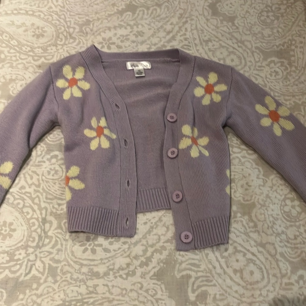 Cute flower sweater.